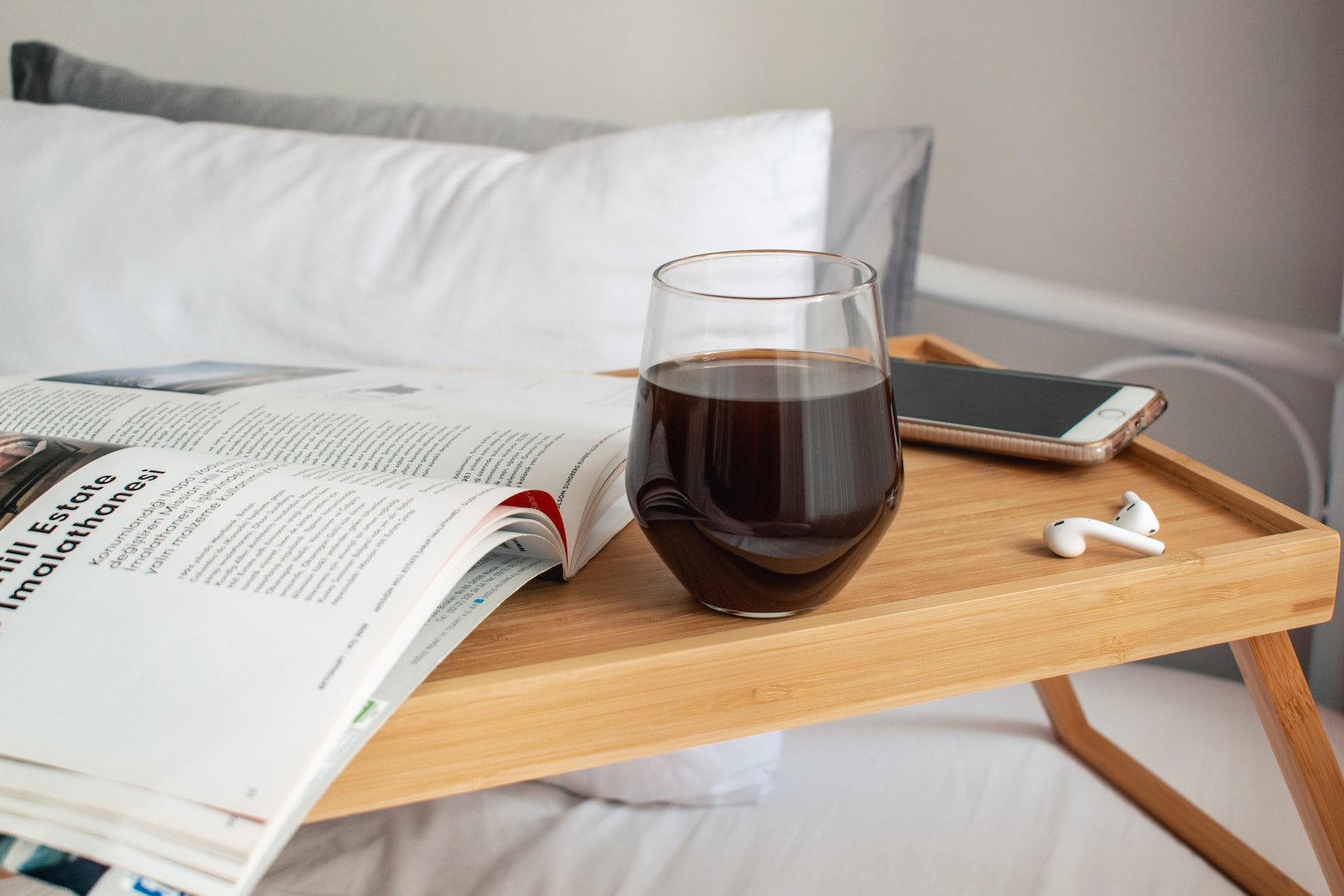 clear drinking glass on brown wooden table